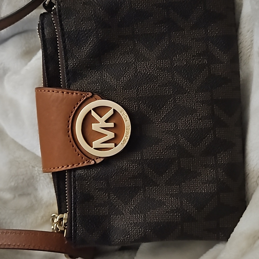 Michael Kors brown mini purse.